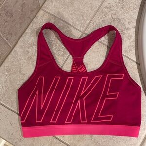 Nike Women's berry colored Sports Bra